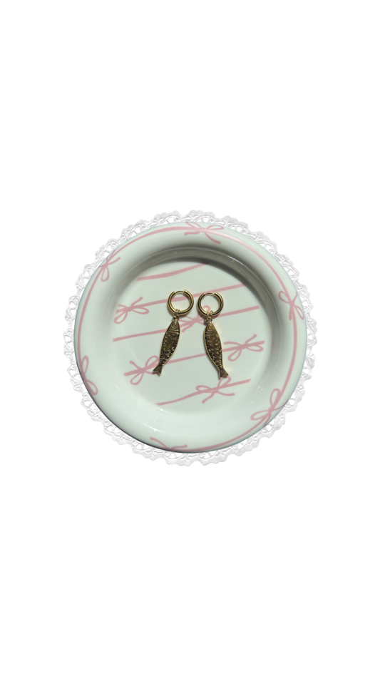 the “canned sardine” earrings
